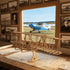 Maquette Wright Flyer en bois sur socle dans bureau aviation vintage avec plans techniques et photos historiques des pionniers
