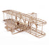 Maquette Wright Flyer puzzle 3D vue de dessus sur fond blanc, structure biplan complète avec moteur, hélices et gouvernes