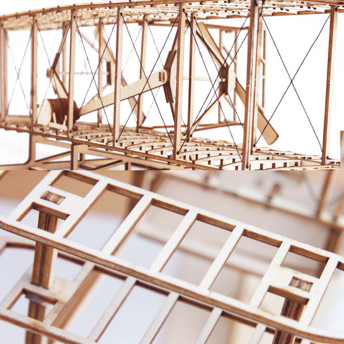 Détails maquette Wright Flyer puzzle 3D, gros plan moteur hélices haubans et structure ailes nervures découpe laser précise
